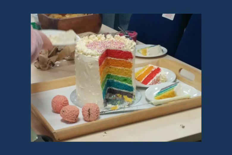 Photo of a rainbow coloured cake from the LGBTQ+ STEM day